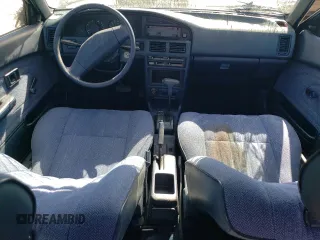 1989 Toyota Corolla z VIN 1NXAE92E2KZ028800, wystawiony jako Copart lot #74139934 z przebiegiem 78 479 mil mil oraz Nie do naprawy • Non repairable. Historia ofert i sprzedaży dostępna na DreamBid. Obrazek 8.