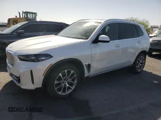 2024 BMW X5 xDrive40i with VIN 5UX23EU09R9V21460, listed as a Copart auction lot 61812405 with 7,288 mi miles and Salvage title. Bid and sale history available at DreamBid. Image 1.