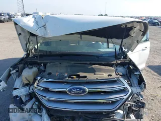2015 Ford Edge SE z VIN 2FMTK3G92FBC22197, wystawiony jako IAAI lot #42578472 z przebiegiem 100 878 mil mil oraz . Historia ofert i sprzedaży dostępna na DreamBid. Obrazek 10.