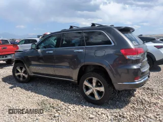 2014 Jeep Grand Cherokee Summit with VIN 1C4RJFJM8EC395169, listed as a Copart auction lot 60637265 with 116,575 mi miles and Salvage title. Bid and sale history available at DreamBid. Image 2.