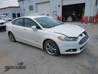2015 Ford Fusion SE Hybrid with VIN 3FA6P0LU2FR305597, listed as a IAAI auction lot 42168292 with 97,688 mi miles and . Bid and sale history available at DreamBid. Image 1.