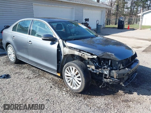 2015 Volkswagen Jetta Sedan 1.8T SE w/Connectivity with VIN 3VWD07AJ2FM312146, listed as a IAAI auction lot 41843238 with 107,741 mi miles. Bid and sale history available at carsss.com. Image 1.