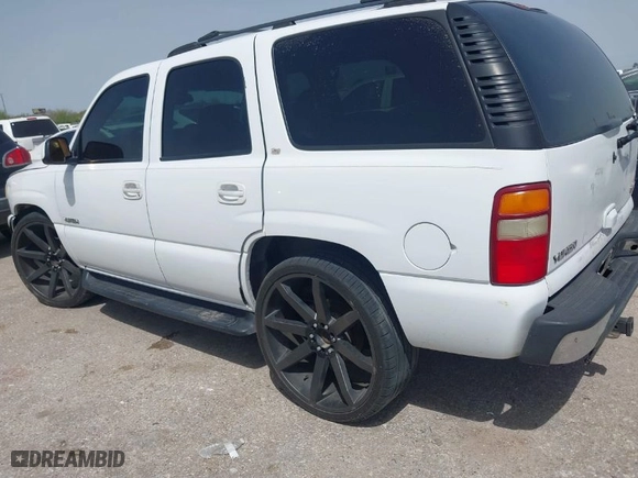 2003 GMC Yukon SLT with VIN 1GKEC13Z33R156583, listed as a IAAI auction lot 41831947 with 156,309 mi miles. Bid and sale history available at carsss.com. Image 3.