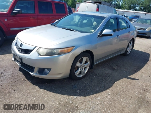 2009 Acura TSX with VIN JH4CU26659C021798, listed as a IAAI auction lot 42565155 with 196,024 mi miles and . Bid and sale history available at DreamBid. Image 2.