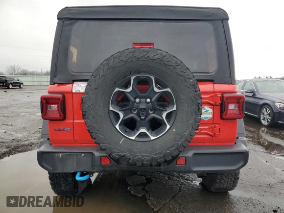 2022 Jeep Wrangler Unlimited Rubicon with VIN 1C4JJXR62NW171306, listed as a Copart auction lot 81366074 with 25,001 mi miles and Clean title. Bid and sale history available at DreamBid. Image 6.
