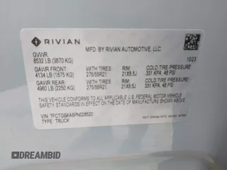 2023 Rivian R1T Adventure z VIN 7FCTGBAA6PN028520, wystawiony jako IAAI lot #42117498 z przebiegiem 24 583 mil mil oraz . Historia ofert i sprzedaży dostępna na DreamBid. Obrazek 9.