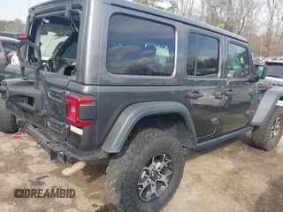 2020 Jeep Wrangler Unlimited Rubicon z VIN 1C4HJXFN8LW176002, wystawiony jako IAAI lot #41662158 z przebiegiem 55 924 mil mil oraz . Historia ofert i sprzedaży dostępna na DreamBid. Obrazek 4.