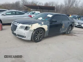 2014 Chrysler 300 with VIN 2C3CCAGG3EH384800, listed as a IAAI auction lot 41818031 with 147,335 mi miles. Bid and sale history available at carsss.com. Image 2.