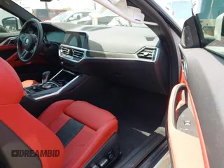 2022 BMW M4 Competition z VIN WBS33AZ04NCJ20752, wystawiony jako IAAI lot #42153801 z przebiegiem 9523 mil mil oraz . Historia ofert i sprzedaży dostępna na DreamBid. Obrazek 5.