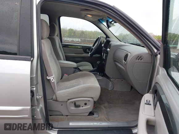 2005 GMC Envoy SLE z VIN 1GKDT13S752159660, wystawiony jako IAAI lot #41996041 z przebiegiem 133 948 mil mil oraz . Historia ofert i sprzedaży dostępna na DreamBid. Obrazek 5.