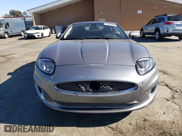 2014 Jaguar XK Touring with VIN SAJWA4EB1ELB54493, listed as a Copart auction lot 71494604 with 73,282 mi miles and Salvage Title. Bid and sale history available at carsss.com. Image 5.