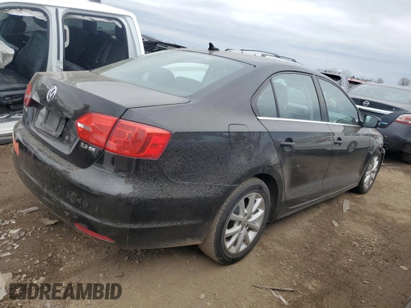 2013 Volkswagen Jetta SE with VIN 3VWDX7AJ9DM376872, listed as a Copart auction lot 50991535 with 138,466 mi miles and Salvage title. Bid and sale history available at DreamBid. Image 3.