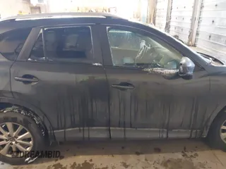2015 Mazda CX-5 Touring with VIN JM3KE2CY2F0458114, listed as a IAAI auction lot 41545493 with 138,061 mi miles. Bid and sale history available at carsss.com. Image 14.