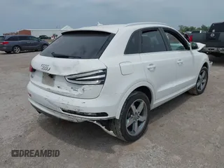 2015 Audi Q3 Premium Plus z VIN WA1EFCFS7FR006939, wystawiony jako IAAI lot #42067797 z przebiegiem 97 663 mil mil oraz . Historia ofert i sprzedaży dostępna na DreamBid. Obrazek 4.