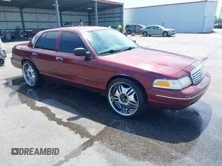 2004 Ford Crown Victoria LX z VIN 2FAHP74W14X132526, wystawiony jako IAAI lot #42101987 z przebiegiem 150 611 mil mil oraz . Historia ofert i sprzedaży dostępna na DreamBid. Obrazek 1.