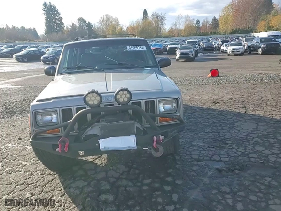 2000 Jeep Cherokee Police with VIN 1J4FF48S5YL195314, listed as a Copart auction lot 81909784 with 95,694 mi miles and Salvage Title. Bid and sale history available at carsss.com. Image 11.