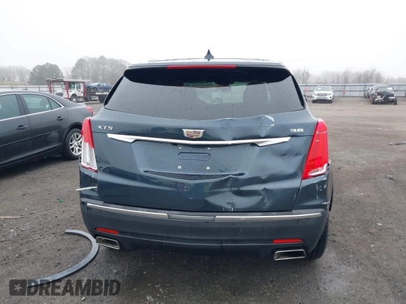2019 Cadillac XT5 FWD with VIN 1GYKNARS5KZ220134, listed as a IAAI auction lot 41472927 with 58,229 mi miles and . Bid and sale history available at DreamBid. Image 16.