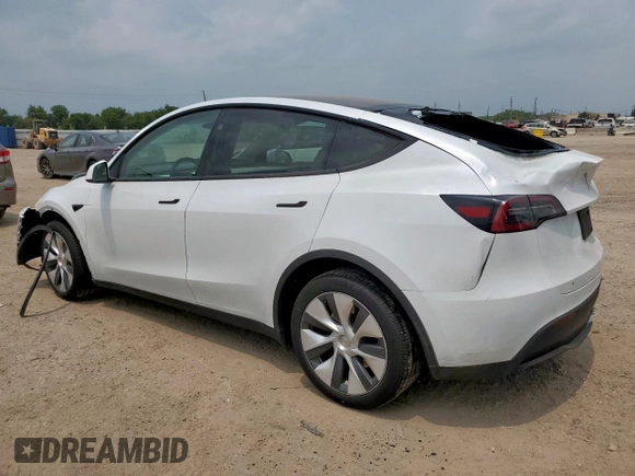 2024 Tesla Model Y Long Range with VIN 7SAYGDEE6RA290124, listed as a Copart auction lot 57662385 with 14,751 mi miles and Salvage title. Bid and sale history available at DreamBid. Image 2.