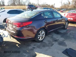 2013 Kia Optima LX z VIN 5XXGM4A71DG186111, wystawiony jako IAAI lot #41189410 z przebiegiem 214 084 mil mil oraz . Historia ofert i sprzedaży dostępna na DreamBid. Obrazek 4.