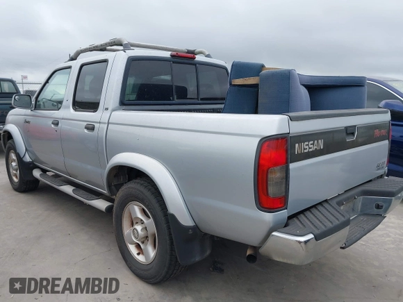 2000 Nissan Frontier XE with VIN 1N6ED27T2YC425703, listed as a IAAI auction lot 42687301 with 186,317 mi miles and . Bid and sale history available at DreamBid. Image 3.