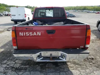 1996 Nissan Frontier XE with VIN 1N6SD16S8TC335129, listed as a Copart auction lot 55884495 with 313,757 mi miles and Salvage title. Bid and sale history available at DreamBid. Image 6.