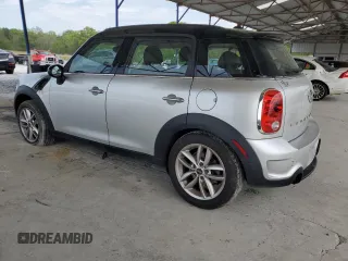 2014 MINI Countryman S with VIN WMWZC3C56EWP29211, listed as a Copart auction lot 52521145 with 91,396 mi miles and Salvage title. Bid and sale history available at DreamBid. Image 2.