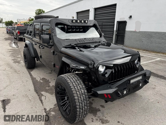 2024 Jeep Gladiator Sport S with VIN 1C6HJTAG2RL132886, listed as a Copart auction lot 63946735 with 6,111 mi miles and Clean title. Bid and sale history available at DreamBid. Image 1.