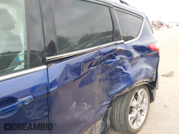 2016 Ford Escape Titanium with VIN 1FMCU0J97GUB96726, listed as a IAAI auction lot 41322229 with 119,237 mi miles. Bid and sale history available at carsss.com. Image 6.