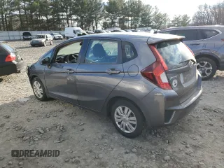 2015 Honda Fit LX with VIN 3HGGK5H51FM714796, listed as a Copart auction lot 83174244 with 121,690 mi miles and Salvage Title. Bid and sale history available at carsss.com. Image 2.