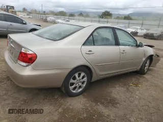 2005 Toyota Camry LE with VIN 4T1BF30K65U082774, listed as a Copart auction lot 52586035 with 119,968 mi miles and Clean Title. Bid and sale history available at DreamBid. Image 3.