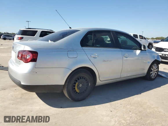 2009 Volkswagen Jetta S z VIN 3VWJM71K79M167562, wystawiony jako Copart lot #80546594 z przebiegiem 196 891 mil mil oraz Szkoda całkowita • Salvage title. Historia ofert i sprzedaży dostępna na DreamBid. Obrazek 3.