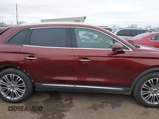 2016 Lincoln MKX Reserve z VIN 2LMPJ6LP0GBL42595, wystawiony jako IAAI lot #41248786 z przebiegiem 99 895 mil mil oraz . Historia ofert i sprzedaży dostępna na DreamBid. Obrazek 14.