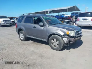 2011 Ford Escape XLT with VIN 1FMCU0D79BKB79697, listed as a IAAI auction lot 41265677 with 138,026 mi miles. Bid and sale history available at carsss.com. Image 1.