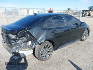 2022 Toyota Corolla SE with VIN 5YFS4MCE1NP109575, listed as a IAAI auction lot 41889417 with 53,517 mi miles. Bid and sale history available at carsss.com. Image 4.