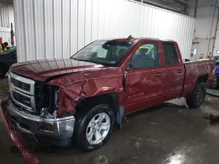 2015 Chevrolet Silverado 1500 LT with VIN 1GCVKREC1FZ184196, listed as a IAAI auction lot 41246741 with 108,028 mi miles and . Bid and sale history available at DreamBid. Image 6.