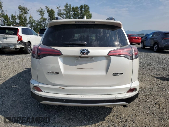2016 Toyota RAV4 Limited with VIN JTMDFREV9GJ066429, listed as a Copart auction lot 61874995 with 77,686 mi miles and Salvage title. Bid and sale history available at DreamBid. Image 6.