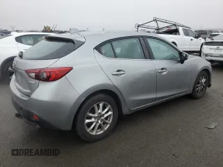 2014 Mazda 3 i Grand Touring with VIN JM1BM1M74E1106463, listed as a Copart auction lot 85144434 with 122,729 mi miles and Salvage Title. Bid and sale history available at DreamBid. Image 3.