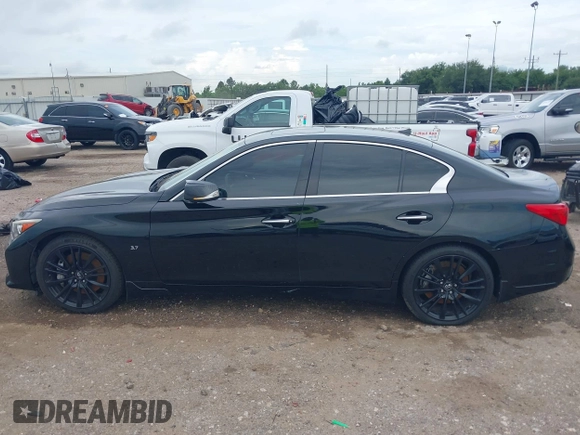 2015 Infiniti Q50 Sport z VIN JN1BV7AP7FM334447, wystawiony jako IAAI lot #42595908 z przebiegiem 168 214 mil mil oraz . Historia ofert i sprzedaży dostępna na DreamBid. Obrazek 14.