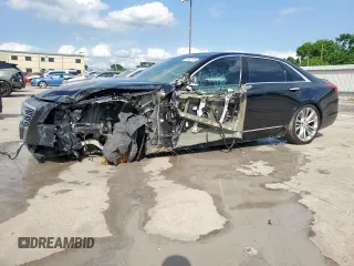 2016 Cadillac CT6 Platinum AWD with VIN 1G6KK5R66GU165550, listed as a Copart auction lot 58582195 with 144,799 mi miles and Salvage title. Bid and sale history available at DreamBid. Image 1.