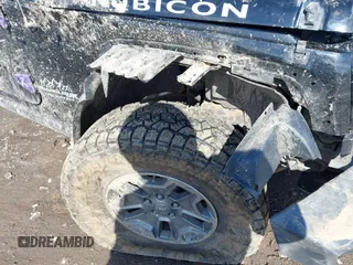 2018 Jeep Wrangler Unlimited Rubicon Recon with VIN 1C4HJWFG1JL915740, listed as a IAAI auction lot 41965305 with 73,035 mi miles and . Bid and sale history available at DreamBid. Image 6.