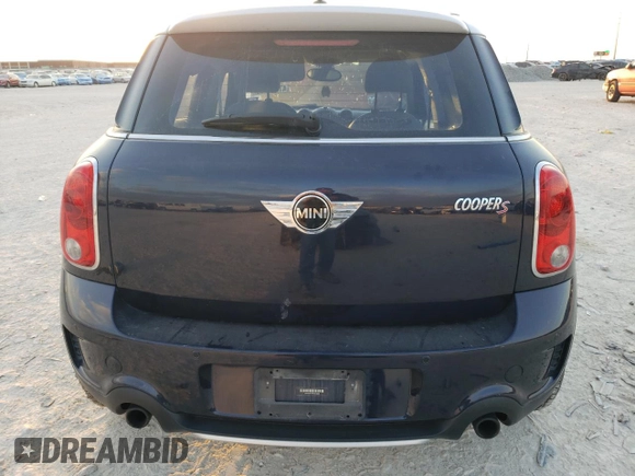 2015 MINI Countryman S with VIN WMWZC5C57FWP48606, listed as a Copart auction lot 47212255 with 104,922 mi miles and Salvage Title. Bid and sale history available at DreamBid. Image 6.