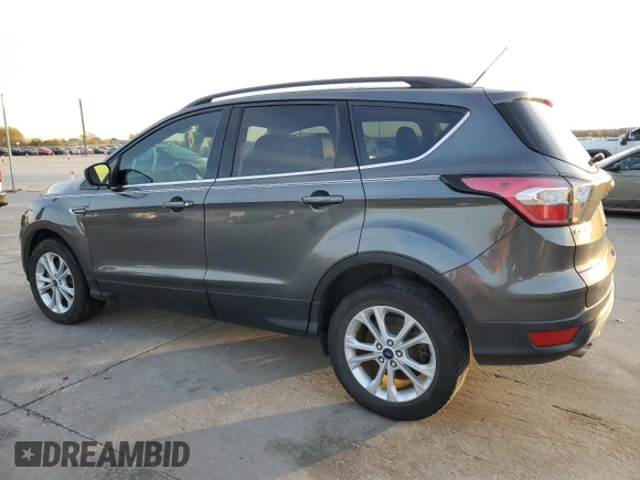 2017 Ford Escape SE with VIN 1FMCU0G91HUE07265, listed as a Copart auction lot 84231444 with 82,990 mi miles and Clean Title. Bid and sale history available at DreamBid. Image 2.
