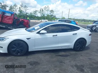 2021 Tesla Model S Plaid с VIN 5YJSA1E62MF438406, выставлен на аукционе IAAI как лот 42246901 с пробегом Не указан миль и . История ставок и продаж доступна на DreamBid. Изображение 14.