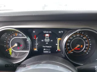 2019 Jeep Wrangler Unlimited Sahara with VIN 1C4HJXEG4KW573157, listed as a IAAI auction lot 42118373 with 105,890 mi miles and . Bid and sale history available at DreamBid. Image 7.