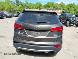 2014 Hyundai Santa Fe with VIN 5XYZTDLB2EG143925, listed as a IAAI auction lot 42243761 with 126,058 mi miles and . Bid and sale history available at DreamBid. Image 16.