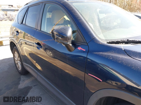 2016 Mazda CX-5 Touring with VIN JM3KE4CY0G0631786, listed as a IAAI auction lot 41761214 with 220,058 mi miles. Bid and sale history available at carsss.com. Image 19.