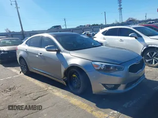 2014 Kia Cadenza Premium z VIN KNALN4D71E5125660, wystawiony jako IAAI lot #40918171 z przebiegiem 63 014 mil mil oraz . Historia ofert i sprzedaży dostępna na DreamBid. Obrazek 1.