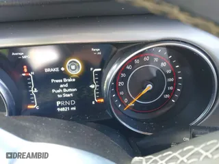 2019 Jeep Wrangler Unlimited Sahara with VIN 1C4HJXEG0KW604937, listed as a IAAI auction lot 40931379 with 94,821 mi miles. Bid and sale history available at carsss.com. Image 7.