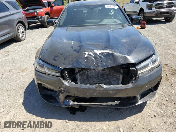 2021 BMW M5 z VIN WBS83CH04MCG09673, wystawiony jako Copart lot #55321695 z przebiegiem 39 443 mil mil oraz Szkody całkowita. Historia ofert i sprzedaży dostępna na DreamBid. Obrazek 5.