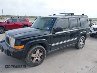 2010 Jeep Commander Sport with VIN 1J4RG4GK6AC122390, listed as a IAAI auction lot 41960335 with 231,829 mi miles. Bid and sale history available at carsss.com. Image 2.